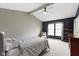 Spacious main bedroom with vaulted ceilings, fan, and natural light at 3724 W 42Nd Ter, Indianapolis, IN 46228