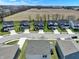 A scenic aerial view of this home and neighborhood reveals lush landscaping and well-maintained homes at 4941 Oak Hill Dr, Lebanon, IN 46052