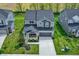 Aerial view of a charming two-story home with well-manicured lawn and a two-car garage at 4941 Oak Hill Dr, Lebanon, IN 46052