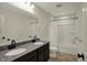Bathroom featuring double sinks, granite counters and shower over tub at 4941 Oak Hill Dr, Lebanon, IN 46052