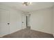 Neutral bedroom featuring neutral carpeting and a modern ceiling fan at 4941 Oak Hill Dr, Lebanon, IN 46052