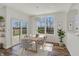 Bright dining area with sliding door access to the backyard, perfect for indoor-outdoor living at 4941 Oak Hill Dr, Lebanon, IN 46052
