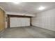 Unfinished garage with drywall and a new garage door at 4941 Oak Hill Dr, Lebanon, IN 46052
