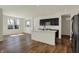Modern kitchen featuring a kitchen island and bright windows at 4941 Oak Hill Dr, Lebanon, IN 46052