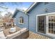 Inviting backyard deck with a fire pit and outdoor seating, perfect for entertaining and relaxation at 5028 Graceland Ave, Indianapolis, IN 46208