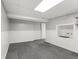 Finished basement with painted paneling and new carpet at 5116 Norway Dr, Indianapolis, IN 46219