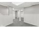 Clean basement with painted walls and new carpet at 5116 Norway Dr, Indianapolis, IN 46219