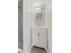 Cozy bathroom featuring a vanity with cabinet storage, a mirror, and a walk-in shower at 5116 Norway Dr, Indianapolis, IN 46219
