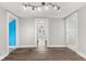 Open-concept living area with wood-look floors and recessed lighting at 5116 Norway Dr, Indianapolis, IN 46219