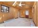Room with wood paneling, skylight, and tiled floor, awaiting your design ideas at 5116 Norway Dr, Indianapolis, IN 46219