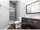 Well-appointed bathroom with modern fixtures, sleek vanity, and a tiled walk-in shower at 5367 Cotton Bay W Dr, Indianapolis, IN 46254
