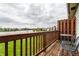 Relax on this deck with views of the lake and enjoy outdoor seating on the wooden deck at 5367 Cotton Bay W Dr, Indianapolis, IN 46254