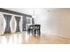 Well-lit dining area with French doors and stylish light fixture at 5367 Cotton Bay W Dr, Indianapolis, IN 46254