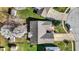 Bird's eye view of the house showcasing the roof, yard, driveway and surrounding neighborhood at 5426 Black Bear Cir, Indianapolis, IN 46239