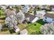 Aerial view of a well-maintained yard with mature trees surrounding a beautiful single-Gathering home at 5426 Black Bear Cir, Indianapolis, IN 46239
