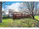Beautiful backyard showcasing a well-maintained lawn, patio area, and mature trees for shade at 5426 Black Bear Cir, Indianapolis, IN 46239