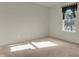 Bright bedroom with neutral carpet, window with treatments, and natural light at 5426 Black Bear Cir, Indianapolis, IN 46239