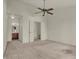 This bedroom boasts neutral carpeting and has an open closet and en-suite bathroom at 5426 Black Bear Cir, Indianapolis, IN 46239
