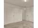 Neutral bedroom boasts fresh paint, neutral carpet, and access to other areas of the home at 5426 Black Bear Cir, Indianapolis, IN 46239
