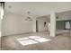 Spacious living area featuring neutral tones, carpet, and an open layout at 5426 Black Bear Cir, Indianapolis, IN 46239