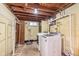 Unfinished basement with laundry hookups, offering potential for storage or customization at 5734 Hillside Ave, Indianapolis, IN 46220
