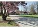 Charming ranch home with long driveway, basketball hoop, mature trees and beautiful magnolia tree at 6047 W 56Th St, Indianapolis, IN 46254