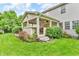 Backyard featuring a covered patio and lush green grass at 6071 Sugar Pine Dr, Avon, IN 46123