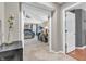 Bedroom entryway showcasing neutral paint and doorway leading to the large room with a seating area at 6071 Sugar Pine Dr, Avon, IN 46123