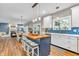 Open concept kitchen with butcher block island, stainless appliances, and easy access to the dining and living areas at 6071 Sugar Pine Dr, Avon, IN 46123