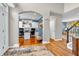 Open-concept office space with custom built-ins and hardwood floors, perfect for remote work at 6071 Sugar Pine Dr, Avon, IN 46123
