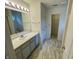 This bathroom has a vanity with lots of storage space and a large mirror with great lighting at 6083 White Birch Dr, Fishers, IN 46038