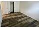 Bedroom featuring laminate flooring and a closet at 6083 White Birch Dr, Fishers, IN 46038