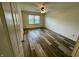 This bedroom is bright with a ceiling fan and a window that provides natural light and a view at 6083 White Birch Dr, Fishers, IN 46038