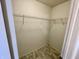 This walk-in closet offers plenty of space with multiple shelves for optimal organization and storage at 6083 White Birch Dr, Fishers, IN 46038