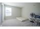Bedroom with carpet, window and mattress on the floor at 7140 Leatherwood Dr, Indianapolis, IN 46259