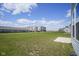 Attractive community with walking paths and apartments on a sunny day with a blue sky and scattered clouds at 7140 Leatherwood Dr, Indianapolis, IN 46259