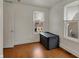 Bright bedroom with hardwood floors and natural light from the window at 725 N Sheffield Ave, Indianapolis, IN 46222