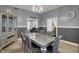 Elegant dining room with stylish furniture, and contemporary lighting with connecting rooms nearby at 725 N Sheffield Ave, Indianapolis, IN 46222