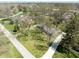 An aerial shot of a home in a verdant, well-maintained neighborhood at 7575 Holliday W Dr, Indianapolis, IN 46260