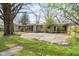 Spacious backyard with a large concrete patio at 7575 Holliday W Dr, Indianapolis, IN 46260