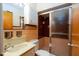 Bathroom with a shower, tile, and vanity at 7575 Holliday W Dr, Indianapolis, IN 46260