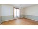 Dining room featuring hardwood floors and natural light at 7575 Holliday W Dr, Indianapolis, IN 46260