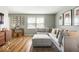 Open-concept living area with a large gray sectional sofa and stylish decor at 7914 Cardinal E Cv, Indianapolis, IN 46256