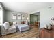 Comfortable living space with a sectional sofa, open to the dining area at 7914 Cardinal E Cv, Indianapolis, IN 46256