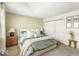 Bright main bedroom featuring a decorative wall, neutral tones and comfortable furnishings at 7914 Cardinal E Cv, Indianapolis, IN 46256