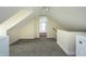 Attic space with carpeting, a light and bright paint color, and washer and dryer hookups at 804 N California St, Indianapolis, IN 46202