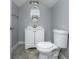 A full bathroom featuring a vanity, mirror, toilet and tile flooring at 804 N California St, Indianapolis, IN 46202