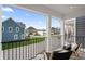 Relaxing balcony with seating overlooking serene waterfront views and neighborhood at 9769 Marina Village Dr, Indianapolis, IN 46256