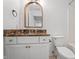 Bathroom features a combined shower and tub with a vanity and attractive countertop at 9769 Marina Village Dr, Indianapolis, IN 46256