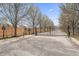 Gated community entrance featuring manicured landscaping, secure access, and a welcoming environment for residents at 9769 Marina Village Dr, Indianapolis, IN 46256